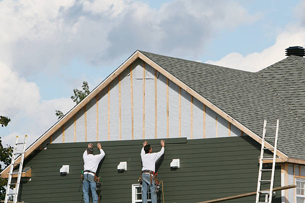 Professional Emergency Siding Repair technician working in Homeworth, OH